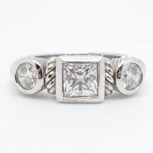 JUDITH RIPKA STERLING SILVER 3 CLEAR CUBIC ZIRCONIA CABLE RING SIZE 6.25: JUDITH RIPKA STERLING SILVER 3 CLEAR CUBIC ZIRCONIA CABLE RING SIZE 6.25 Judith Ripka Sterling Silver Square & Circle Bezel 3 Clear Cubic Zirconia Cable Ring Size - 6.25 Band Width - 3mm Height - 6mm 