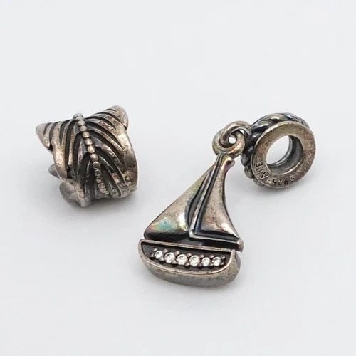 AUTHENTIC PANDORA STERLING SILVER SAIL AWAY BOAT CLEAR CZ & FEATHER CHARMS: AUTHENTIC PANDORA STERLING SILVER SAIL AWAY BOAT CLEAR CZ & FEATHER CHARMS Authentic Pandora Sterling Silver Sail Away Boat Clear Cubic Zirconia & Feather Retired Charms Style # 791138CZ & 790581 Tota