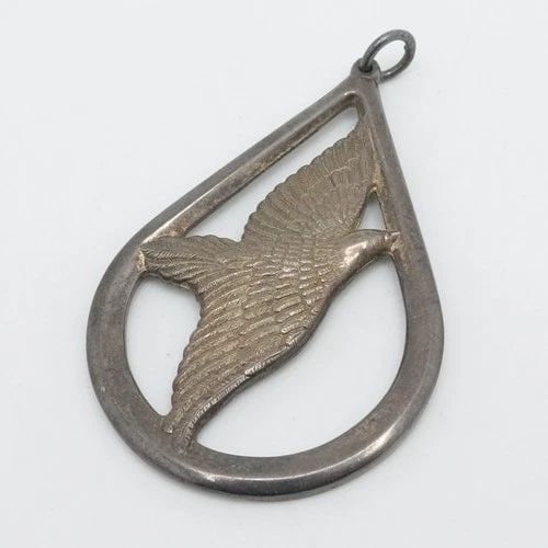 WALLACE STERLING SILVER DOVE ORNAMENT PEACE ON EARTH LARGE PENDANT 2.25": WALLACE STERLING SILVER DOVE ORNAMENT PEACE ON EARTH LARGE PENDANT 2.25" Wallace Sterling Silver Peace On Earth Dove Ornament Large Pendant Length - 2.25" Width - 1.38" Bail Height - 4mm Total Weight 