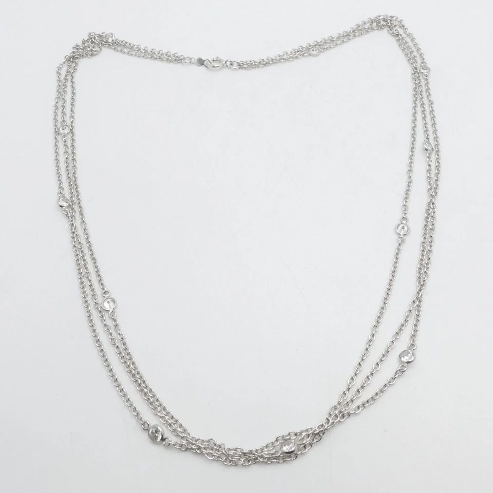 JCM SIGNED STERLING SILVER CLEAR CUBIC ZIRCONIA MULTI CHAIN STATION NECKLACE 18": JCM Signed Sterling Silver Round Clear Cubic Zirconia Multi Chain Station Necklace Length - 18" Long Chain Width - 1mm Total Weight - 7.5 Grams
