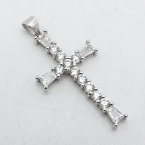 STERLING SILVER CROSS PAVE CLEAR CUBIC ZIRCONIA PENDANT 1.5": STERLING SILVER CROSS PAVE CLEAR CUBIC ZIRCONIA PENDANT 1.5" Sterling Silver Cross Pave Clear Cubic Zirconia Pendant Length - 1.5" Width - 0.75" Bail Size (H x W) - 3.5mm x 3.5mm Total Weight - 2.4Gra