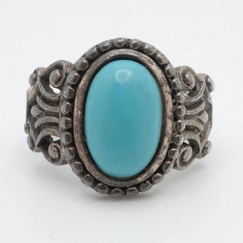 AVON STERLING SILVER CABOCHON TURQUOISE GEMSTONE SCROLL RING SIZE 7.75: AVON STERLING SILVER CABOCHON TURQUOISE GEMSTONE SCROLL RING SIZE 7.75 Sterling Silver Turquoise Gemstone Navajo Style Scroll Ring Size - 7.75 Band Width - 3mm Length - 17mm Total Weight - 7 Grams Gre