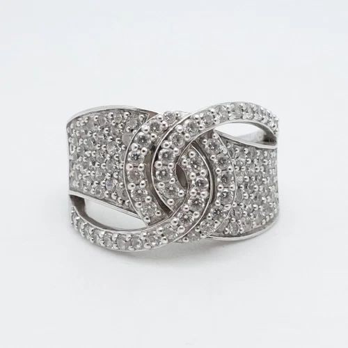 ARIVA STERLING SILVER PAVE CZ CUBIC ZIRCONIA BAND CRISSCROSS RING - SIZE 8.25: ARIVA STERLING SILVER PAVE CZ CUBIC ZIRCONIA BAND CRISSCROSS RING - SIZE 8.25 Ariva Sterling Silver Clear Cubic Zirconia Crisscross Band Ring Size - 8.25 Band Width - 4mm Total Weight - 8.6 Grams