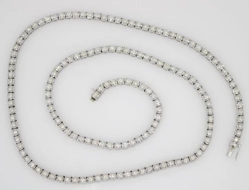 ICEBOX 14K WHITE GOLD 4 TCW NATURAL DIAMOND TENNIS NECKLACE 22" - 35.6 GRAMS: ICEBOX 14K WHITE GOLD 4 TCW NATURAL DIAMOND TENNIS NECKLACE 22" - 35.6 GRAMS Description Icebox 14K White Gold 4 TCW Natural Diamond Tennis Necklace Necklace is in good condition. May show signs of we