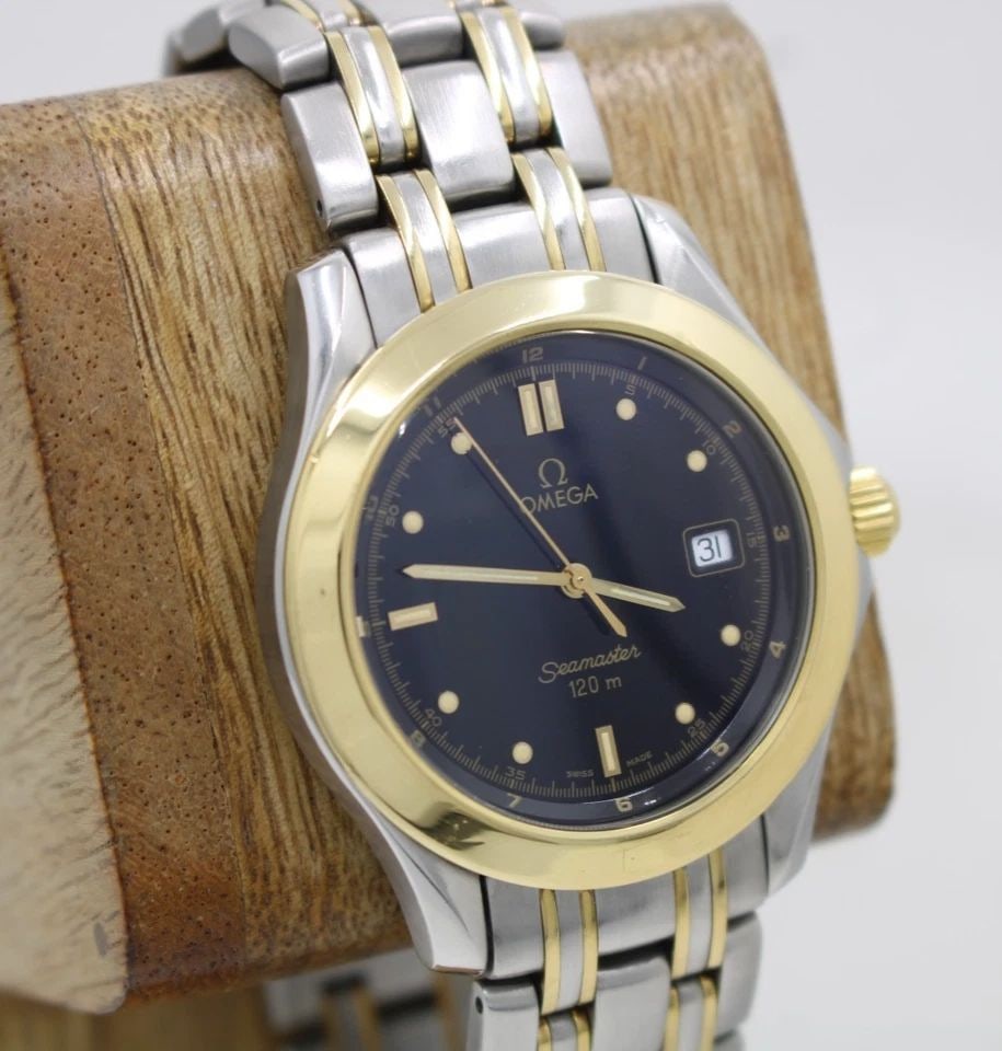 OMEGA SEAMASTER 18K GOLD TWO-TONE 36MM BLACK DATE DIAL QUARTZ WATCH 1501/823: OMEGA SEAMASTER 18K GOLD TWO-TONE 36MM BLACK DATE DIAL QUARTZ WATCH 1501/823 Description Omega Seamaster 18K Gold Two-Tone 36mm Black Date Dial Quartz Watch The watch has been used previously. The wat