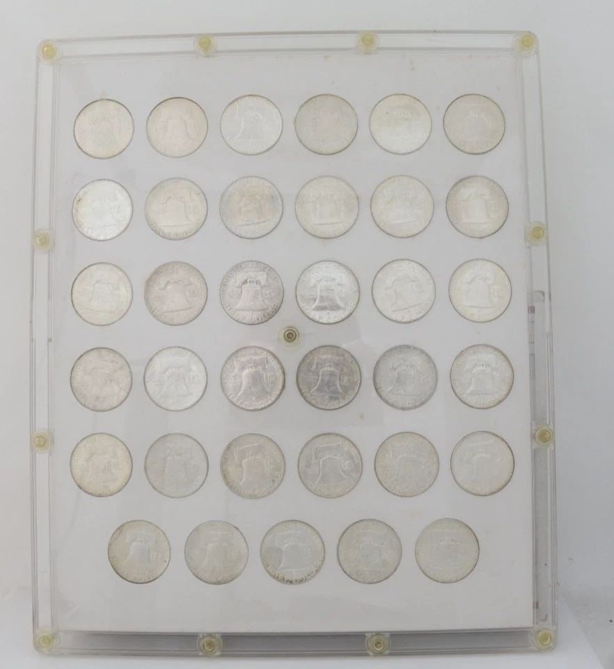 35 FRANKLIN HALF DOLLAR 90% SILVER COINS 1948 TO 1963 D P S COLLECTION: 35 FRANKLIN HALF DOLLAR 90% SILVER COINS 1948 TO 1963 D P S COLLECTION Description 35 Franklin Half Dollar 90% Silver Coins 1948 to 1963 D P S Collection Coins are BU/AU condition. May show signs of t