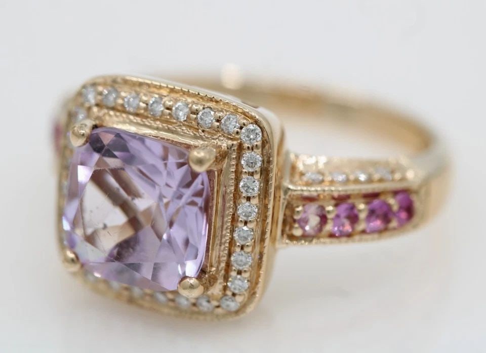 LEVIAN 14K STRAWBERRY GOLD AMETHYST, SAPPHIRE & DIAMOND RING SIZE 6.5 - 6 GRAMS: LEVIAN 14K STRAWBERRY GOLD AMETHYST, SAPPHIRE & DIAMOND RING SIZE 6.5 - 6 GRAMS Description LeVian 14k Strawberry Gold Amethyst, Sapphire & Diamond Ring Ring is in good condition. May show signs of we