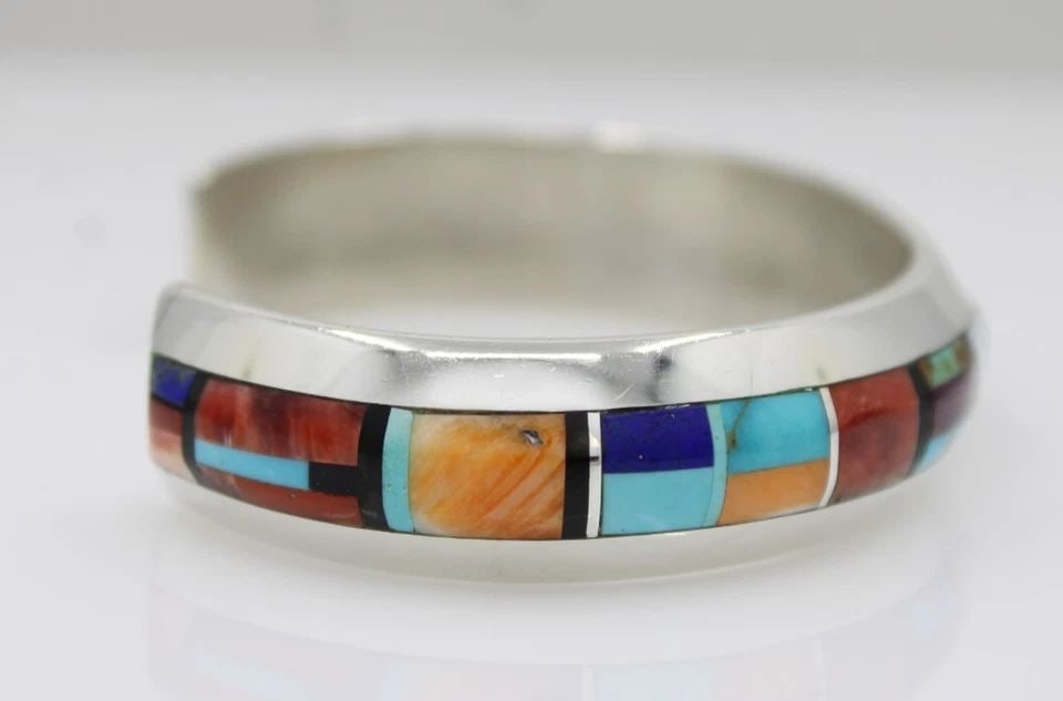 WILFORD CHEE NAVAJO STERLING SILVER MULTICOLOR STONE INLAY CUFF BRACELET 6.5": WILFORD CHEE NAVAJO STERLING SILVER MULTICOLOR STONE INLAY CUFF BRACELET 6.5" WILFORD CHEE NAVAJO STERLING SILVER MULTICOLOR STONE INLAY CUFF BRACELET 6.5" Description Wilford Chee Navajo Sterling Sil