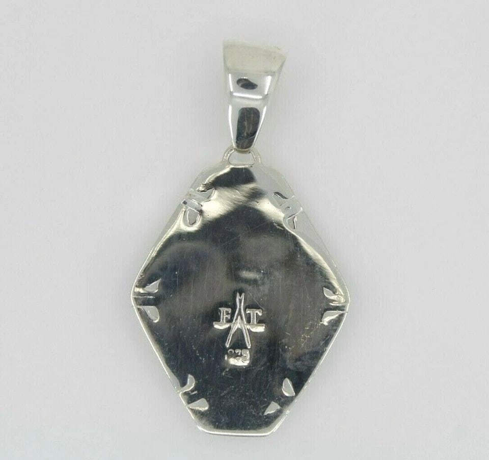 LARGE FT NAVAJO INLAID KINGMAN TURQUOISE STERLING SILVER PENDANT ~ 24.1 GRAMS: LARGE FT NAVAJO INLAID KINGMAN TURQUOISE STERLING SILVER PENDANT ~ 24.1 GRAMS Description Large Navajo Kingman Turquoise Inlaid Sterling Silver Pendant Signed FT Item is in great condition. May show s