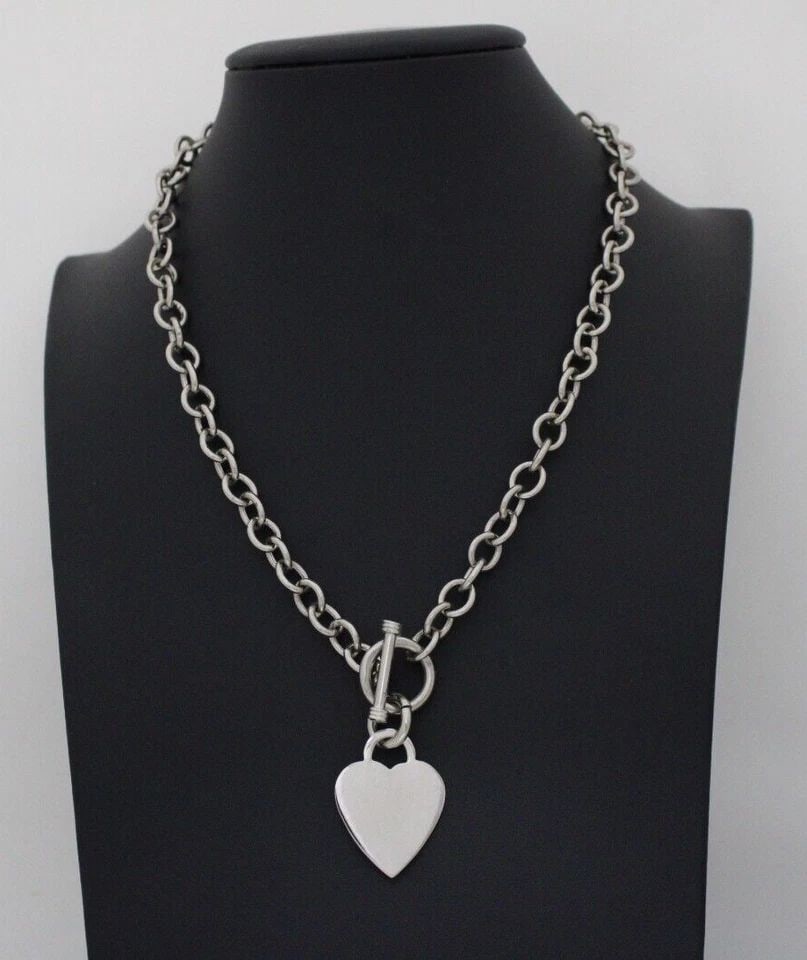STERLING SILVER 16" CABLE CHAIN NECKLACE WITH 1" HEART TAG PENDANT ~ 45.7 GRAMS: STERLING SILVER 16" CABLE CHAIN NECKLACE WITH 1" HEART TAG PENDANT ~ 45.7 GRAMS Description Sterling Silver 16" Cable Chain Necklace with 1" Heart Tag Pendant Necklace in great condition. May show sig