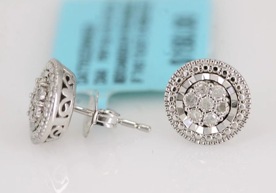 BELK & CO. 925 STERLING SILVER 1/10 CT. TW NATURAL DIAMOND EARRINGS: BELK & CO. 925 STERLING SILVER 1/10 CT. TW NATURAL DIAMOND EARRINGS Description Belk & Co. 925 Sterling Silver 1/10 ct. tw Natural Diamond Earrings The earrings are in new condition. Approximate Measu
