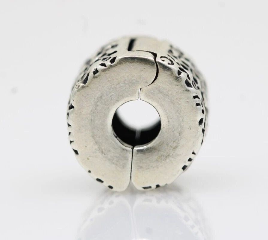 AUTHENTIC PANDORA STERLING MOMENTS LAYERS OF LACE CLIP BEAD CHARM 791758: AUTHENTIC PANDORA STERLING MOMENTS LAYERS OF LACE CLIP BEAD CHARM 791758 Description Authentic Pandora Sterling Moments Layers of Lace Clip Bead Charm 791758 "Four charms available. One charm per purc