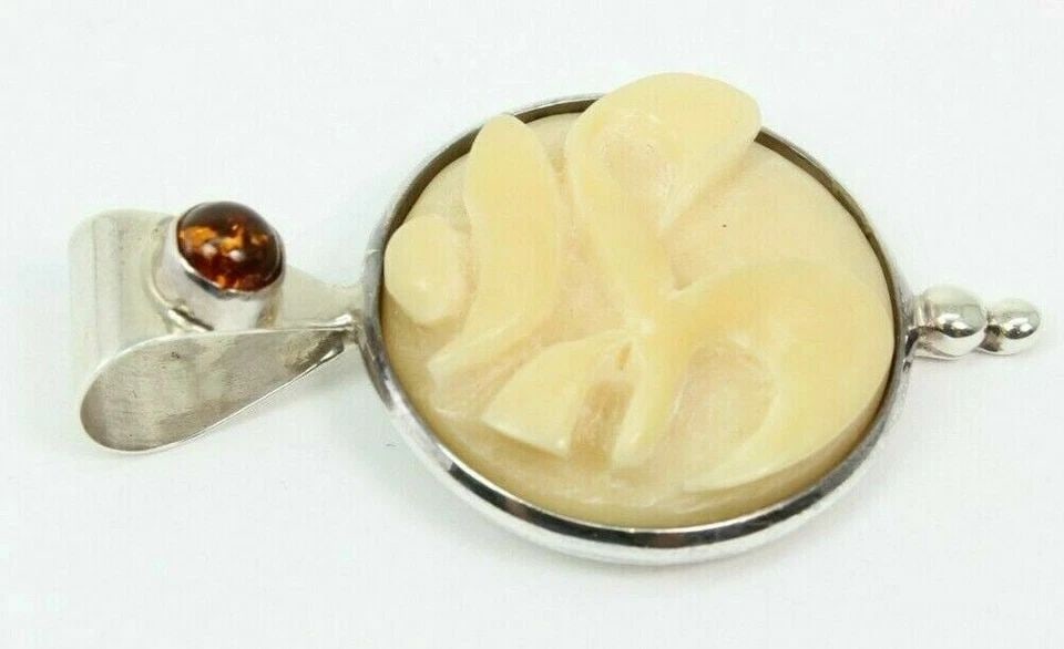 STERLING SILVER OM SYMBOL CARVED PENDANT W/ AMBER ACCENT YOGA SPIRITUAL: STERLING SILVER OM SYMBOL CARVED PENDANT W/ AMBER ACCENT YOGA SPIRITUAL Description STERLING SILVER OM SYMBOL CARVED PENDANT W/ AMBER ACCENT YOGA SPIRITUAL Item is in good condition. May show signs of