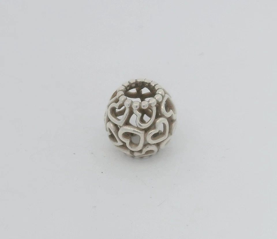 PANDORA STERLING SILVER OPENWORK HEARTS ALL OVER CHARM 790964: PANDORA STERLING SILVER OPENWORK HEARTS ALL OVER CHARM 790964 Description Pandora Sterling Silver Openwork Hearts All Over Charm 790964 Item is in good condition. May show signs of wear and/or tear. A