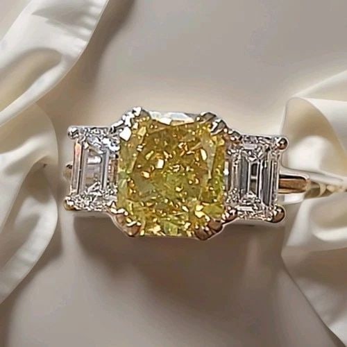 VINTAGE 14K WHITE GOLD ENGAGEMENT RING 3.71CT.NATURAL YELLOW RADIANT DIAMOND GIA: VINTAGE 14K WHITE GOLD ENGAGEMENT RING 3.71CT.NATURAL YELLOW RADIANT DIAMOND GIA This vintage 14K white gold engagement ring features a stunning 3.71CT natural yellow radiant diamond certified by GIA.