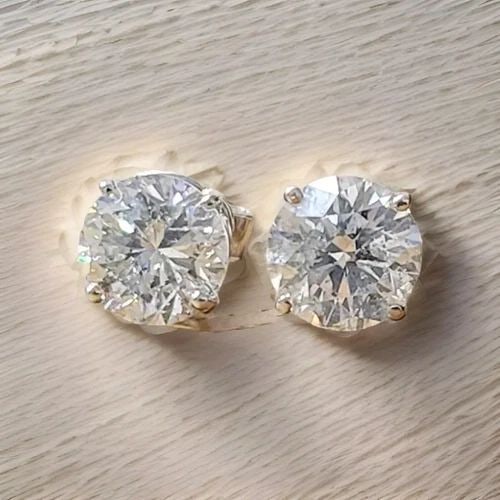 VINTAGE 14K WHITE GOLD STUDS EARRINGS 5.18CT. NATURAL ROUND DIAMOND: VINTAGE 14K WHITE GOLD STUDS EARRINGS 5.18CT. NATURAL ROUND DIAMOND Elevate your jewelry collection with these vintage 14K white gold stud earrings, featuring 5.18ct natural round diamonds. These earr