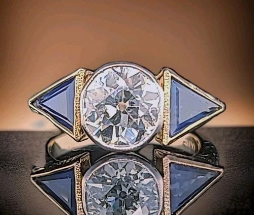 18K YELLOW GOLD VINTAGE ENGAGEMENT RING 3.35CT.NATURAL OLD EURO ROUND DIAMOND: 18K YELLOW GOLD VINTAGE ENGAGEMENT RING 3.32CT.NATURAL OLD EURO ROUND DIAMOND This exquisite vintage engagement ring, crafted in 18K yellow gold, hails from the 1940s Retro era and showcases timeless 