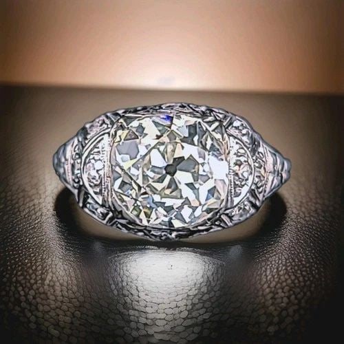 PLATINUM VINTAGE FILIGREE ENGAGEMENT RING 2.78CT. NATURAL OLD MINE DIAMOND GIA: PLATINUM VINTAGE FILIGREE ENGAGEMENT RING 2.78CT. NATURAL OLD MINE DIAMOND GIA This exquisite Art Deco platinum engagement ring dates to the 1920s, featuring a natural 2.78ct old mine cut diamond at i