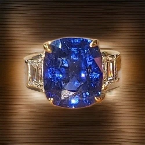 VINTAGE 18K PLATINUM ENGAGEMENT RING 10.41CT.NATURAL CUSHION BLUE SAPPHIRE GIA: VINTAGE 18K PLATINUM ENGAGEMENT RING 10.41CT.NATURAL CUSHION BLUE SAPPHIRE GIA Make a lasting impression with this exceptional vintage engagement ring, handcrafted in 18K yellow gold and platinum. At 