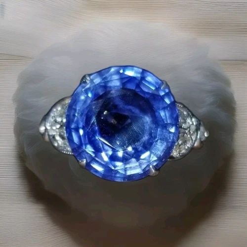 VINTAGE PLATINUM ENGAGEMENT RING 7.20CT. NATURAL BLUE SAPPHIRE ROUND CUT: VINTAGE PLATINUM ENGAGEMENT RING 7.20CT. NATURAL BLUE SAPPHIRE ROUND CUT VINTAGE Platinum ring natural blue sapphire round SHAPE .WEIGHT 7.20 CARAT SIZE 12.5MM CENTER set a gorgeous natural round blue