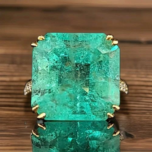 VINTAGE 14K YELLOW GOLD ENGAGEMENT RING 18.46CT. NATURAL COLOMBIA EMERALD: VINTAGE 14K YELLOW GOLD ENGAGEMENT RING 18.46CT. NATURAL COLOMBIA EMERALD GORGEOUS 14K YELLOW GOLD natural green Colombian emerald in emerald shape center weight 18.46ct. size 16mm very nice medium gr