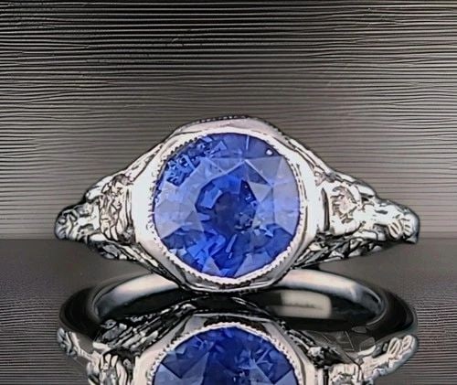 PLATINUM VINTAGE ENGAGEMENT RING 3.48CT. NATURAL ROUND SAPPHIRE GIA CERT 1930'S: PLATINUM VINTAGE ENGAGEMENT RING 3.48CT. NATURAL ROUND SAPPHIRE GIA CERT 1930'S Vintage Art Deco platinum ring dating to the circa 1930s, featuring a natural unheated blue sapphire weighing 3.48 carat
