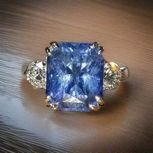14K WHITE GOLD ENGAGEMENT RING 7.29CT. NATURAL BLUE SAPPHIRE RADIANT CUT: 14K WHITE GOLD ENGAGEMENT RING 7.29CT. NATURAL BLUE SAPPHIRE RADIANT CUT GORGEOUS 14K WHITE GOLD engagement ring natural blue sapphire in radiant shape. center natural sapphire in radiant shape weight