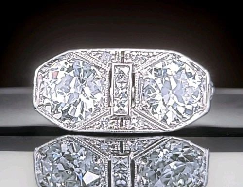 2.30CT. PLATINUM VINTAGE FILIGREE ENGAGEMENT RING NATURAL OLD EURO CUT: 2.30CT. PLATINUM VINTAGE FILIGREE ENGAGEMENT RING NATURAL OLD EURO CUT 1920'S A truly exquisite Art Deco engagement ring, dating to the 1920s, masterfully crafted in platinum and adorned with intricat