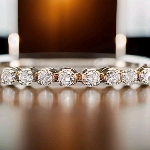 14K YELLOW GOLD TENNIS BRACELET 9.75CT NATURAL ROUND DIAMONDS 7 INCHES: 14K YELLOW GOLD TENNIS BRACELET 9.75CT NATURAL ROUND DIAMONDS 7 INCHES This 14K Yellow Gold Tennis Bracelet features 36 diamonds approx weight 9.75CT of natural round diamonds in SI-H-I color. 7 inche