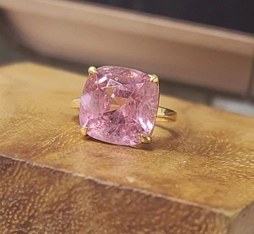 TIFFANY & CO. 18K YELLOW GOLD RING 11.15CT. NATURAL PINK TOURMALINE CUSHION CUT: TIFFANY & CO. 18K YELLOW GOLD RING 11.15CT. NATURAL PINK TOURMALINE CUSHION CUT This authentic Tiffany & Co. ring showcases a breathtaking 9.95 carat natural pink tourmaline, beautifully set in solid 