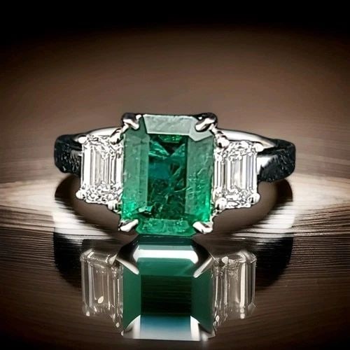 VINTAGE 14K WHITE GOLD ENGAGEMENT THREE STONE RING 1.87CT.NATURAL GREEN EMERALD: VINTAGE 14K WHITE GOLD ENGAGEMENT THREE STONE RING 1.87CT.NATURAL GREEN EMERALD GORGEOUS Vintage 14K WHITE GOLD gem natural emerald in emerald shape. center natural emerald weight 1.87ct. size 9x6.6mm