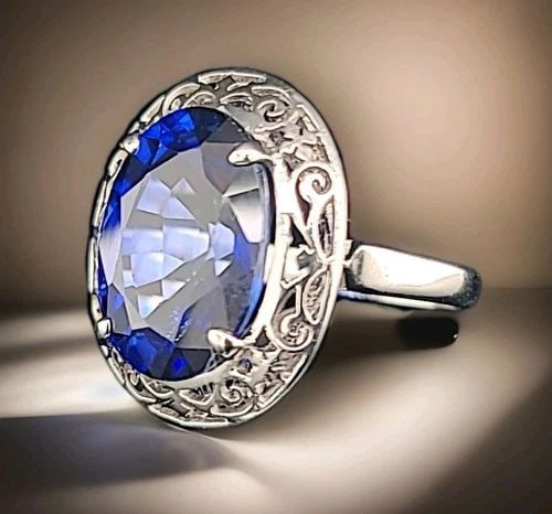 VINTAGE 14K WHITE GOLD ENGAGEMENT RING 12.62CT.LAB GROWN BLUE SAPPHIRE OVAL CUT: VINTAGE 14K WHITE GOLD ENGAGEMENT RING 12.62CT. GEM OVAL BLUE SAPPHIRE GORGEOUS VINTAGE ELEGANT 14K WHITE GOLD ENGAGEMENT RING CIRC 1950'S CENTER LAB GROWN BLUE SAPPHIRE IN OVAL SHAPE WEIGHT 12.62CARA