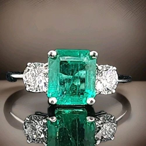 14K WHITE GOLD ENGAGEMENT RING RING 2.10CT.NATURAL GREEN EMERALD GIA CERT: 14K WHITE GOLD ENGAGEMENT RING RING 2.10CT.NATURAL GREEN EMERALD GIA CERT GORGEOUS 14K white gold emerald engagement ring.Center natural green emerald weight 2.10ct. size 7.7x6.7mm GIA cert laboratory