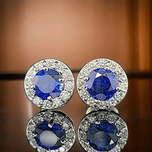 14K WHITE GOLD 4.02CT. GEM ROUND BLUE SAPPHIRE STUDS HOLLOW EARRINGS: 14K WHITE GOLD 4.02CT. GEM ROUND BLUE SAPPHIRE STUDS HOLLOW EARRINGS Gorgeous 14k white gold blue sapphire studs hollow earrings 4.02ct total weight natural diffused treated blue sapphire in round sha