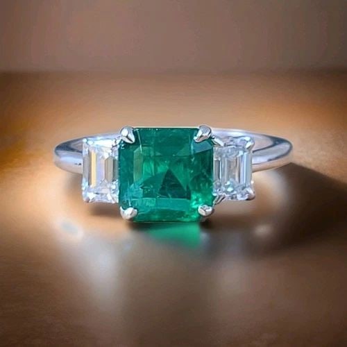 14K WHITE GOLD NATURAL EMERALD RING 1.73CT RADIANT CUT W/ 0.80CT DIAMOND ACCENTS: 14K WHITE GOLD ENGAGEMENT RING 1.73CT. NATURAL GREEN EMERALD RADIANT SHAPE GORGEOUS 14K WHITE GOLD gem natural emerald in radiant shape. center natural emerald weight 1.73ct. size 7.5x7.4mm very nice 