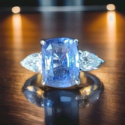 14K WHITE GOLD ENGAGEMENT RING 2.71CT. NATURAL BLUE SAPPHIRE CUSHION CUT: 14K WHITE GOLD ENGAGEMENT RING 2.71CT. NATURAL BLUE SAPPHIRE CUSHION CUT Gorgeous 14k white gold natural blue sapphire engagement ring center natural blue sapphire in cushion shape weight 2.71ct. Size