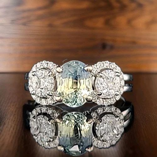 14K WHITE GOLD ENGAGEMENT RING 1.62CT. NATURAL BIO COLOR SAPPHIRE OVAL SHAPE: 14K WHITE GOLD ENGAGEMENT RING 1.62CT. NATURAL BIO COLOR SAPPHIRE OVAL SHAPE GORGEOUS 14K WHITE GOLD engagement ring with natural bio-color sapphire in an oval shape, the center natural sapphire yello