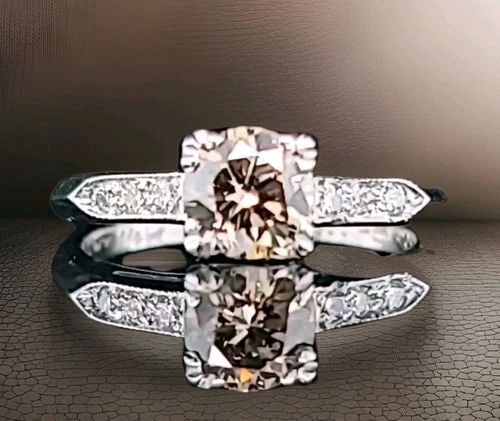 VINTAGE PLATINUM ENGAGEMENT RING 0.71CT.NATURAL CHAMPAGNE ROUND CUT DIAMOND GIA: VINTAGE PLATINUM ENGAGEMENT RING 0.78CT.NATURAL EURO CUT ROUND DIAMOND Vintage platinum euro round cut diamond engagement RING CENTER natural euro round cut diamond WEIGHT 0.78CT SIZE 5.5mm SI2-H- col