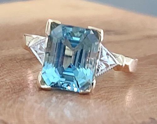 VINTAGE 1930S 14K YELLOW GOLD AQUAMARINE RING 3.24CT EMERALD CUT ENGAGEMENT RING: VINTAGE 14K YELLOW GOLD RING 3.24CT. NATURAL GEM SKY AQUAMARINE EMERALD SHAPE VINTAGE 14K YELLOW GOLD ENGAGEMENT RING CIRC 1930'S NATURAL GEM SKY BLUE AQUAMARINE IN EMERALD SHAPE CENTER AQUAMARINE WEI