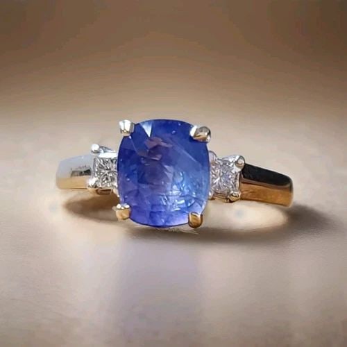 14K WHITE GOLD ENGAGEMENT RING 2.21CT. NATURAL UNTREATED BLUE SAPPHIRE CUSHION: 14K WHITE GOLD ENGAGEMENT RING 2.21CT. NATURAL UNTREATED BLUE SAPPHIRE CUSHION This stunning 14K white gold engagement ring features a beautiful cushion-shaped blue sapphire stone, with a total carat 