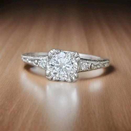PLATINUM VINTAGE ENGAGEMENT RING 0.62CT.NATURAL OLD EURO ROUND DIAMOND 1920'S: PLATINUM VINTAGE ENGAGEMENT RING 0.62CT.NATURAL OLD EURO ROUND DIAMOND 1920'S This authentic Art Deco engagement ring from the 1920s features a 0.62ct natural Old European–cut round diamond set in s