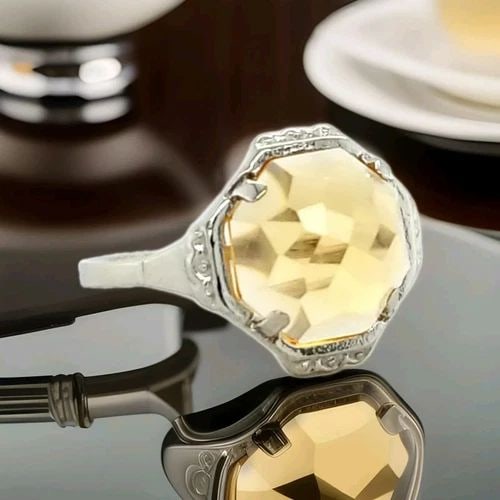 VINTAGE PLATINUM ENGAGEMENT RING 2.67CT. GOLDEN CITRINE OCTAGON ROSE CUT: VINTAGE PLATINUM ENGAGEMENT RING 2.67CT. GOLDEN CITRINE OCTAGON ROSE CUT This vintage platinum engagement ring is a true statement piece. The ring features a stunning golden citrine octagon rose cut s