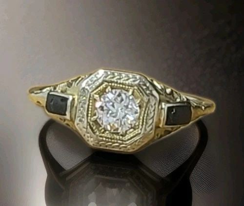18K WHITE GOLD VINTAGE ENGAGEMENT RING 0.25CT NATURAL OLD EURO CUT DIAMOND: 18K WHITE GOLD VINTAGE ENGAGEMENT RING 0.25CT NATURAL OLD EURO CUT DIAMOND This stunning circa 1920s Art Deco engagement ring is crafted in 18K white gold and features exquisite hand-pierced filigree 