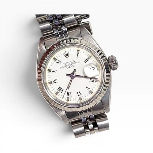 ROLEX LADIES DATE 26MM STEEL JUBILEE WHITE ROMAN AUTOMATIC WATCH 6917 CIRCA 1981: ROLEX LADIES DATE 26MM STEEL JUBILEE WHITE ROMAN AUTOMATIC WATCH 6917 CIRCA 1981 Manufacturer Rolex Category Oyster Perpetual Ladies Date Reference Number 6917 Band Stainless Steel Band Color Steel Ba