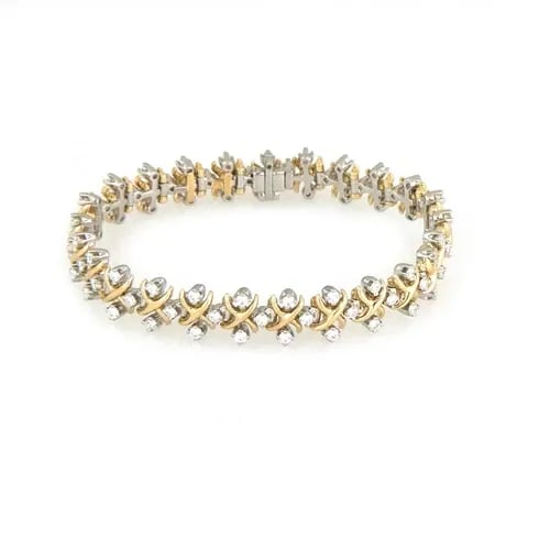 TIFFANY & CO. SCHLUMBERGER DIAMOND BRACELET 18K GOLD PLATINUM X LINK STYLE: TIFFANY & CO. SCHLUMBERGER DIAMOND BRACELET 18K GOLD PLATINUM X LINK STYLE A stunning authentic bracelet from Tiffany & Co. by designer Schlumberger from his X Collection. It is crafted from 18k yello
