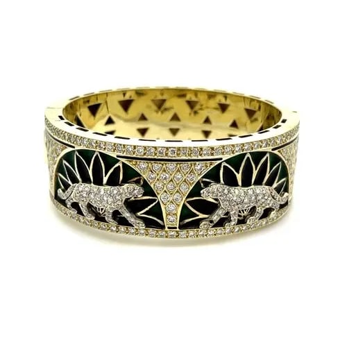 DIAMONDS 14K PANTHER BRACELET YELLOW GOLD ENAMEL WIDE BANGLE: DIAMONDS 14K PANTHER BRACELET YELLOW GOLD ENAMEL WIDE BANGLE This is a large, impressive bracelet, it is well crafted from 14k yellow and white gold with a polished finish. The front half has two half
