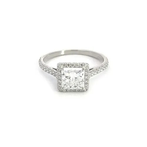 TIFFANY & CO. SOLESTE 1.14CT E VS1 DIAMOND PLATINUM HALO ENGAGEMENT W/CERT: TIFFANY & CO. SOLESTE 1.14CT E VS1 DIAMOND PLATINUM HALO ENGAGEMENT W/CERT Tiffany & Co. Soleste 1.14ct E VS1 Diamond Platinum Halo Engagement w/Cert Description This stunning authentic engagement rin