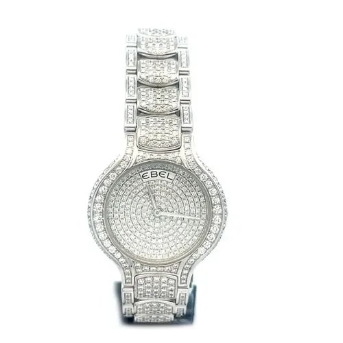 EBEL VANUA GOLD DIAMOND WRISTWATCH ICED OUT LADIES 18K WHITE QUARTZ ALL ORIGINAL: This stunning eye-catching Ebel's Iced Out diamond and 18k white gold wristwatch is a luxurious timepiece designed for women. With a full pave set white diamonds face, this watch exudes elegance and s