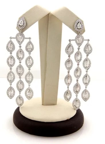 DIAMOND CHANDELIER GOLD EARRINGS 7.90CT 18K WHITE LONG DANGLE STYLE: DIAMOND CHANDELIER GOLD EARRINGS 7.90CT 18K WHITE LONG DANGLE STYLE This pair of luxurious earrings is crafted from 18k white gold featuring long chandelier style with 3 long strands of pear and marqu