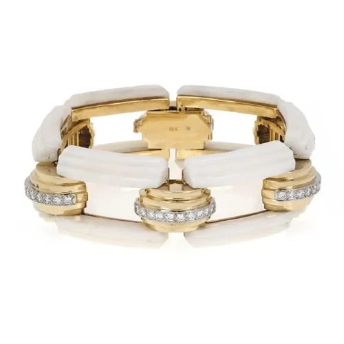 DIAMOND WHITE STONE BRACELET 18K GOLD 23.5MM FANCY LINK: DIAMOND WHITE STONE BRACELET 18K GOLD 23.5MM FANCY LINK The Diamond White Stone Bracelet in 18k Gold with a 23.5mm fancy link is a luxurious and stylish piece of fine jewelry. This bracelet features a